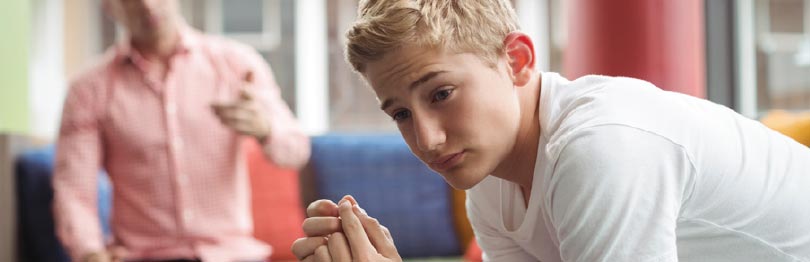Teen boy looking contemplative